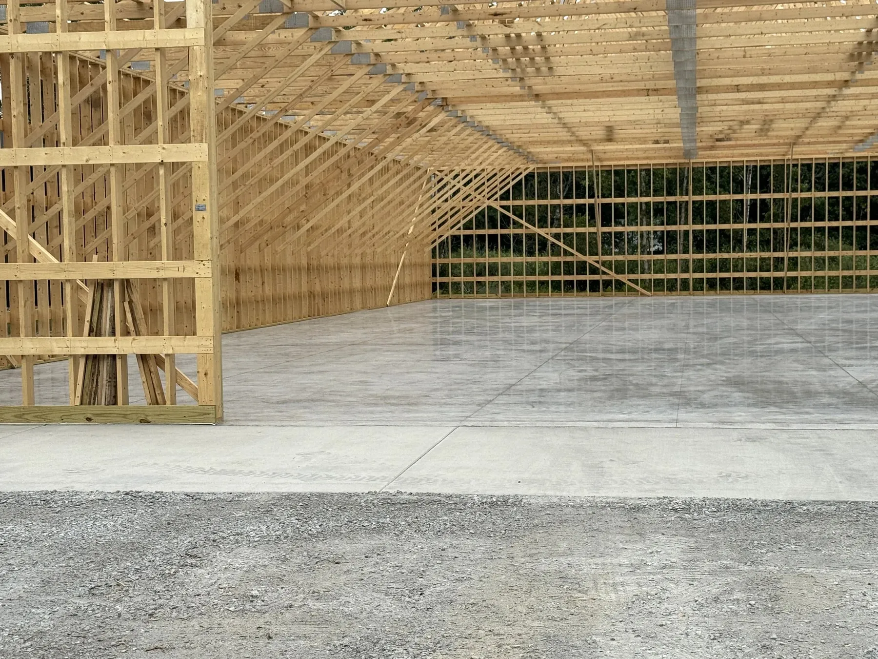 Interior view of the August 2025 pole-shed concrete floor.